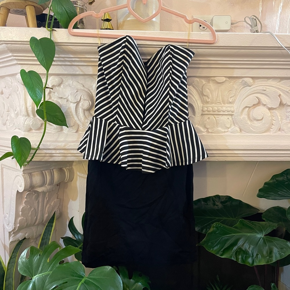 Black and white striped, strapless peplum cocktail dress
